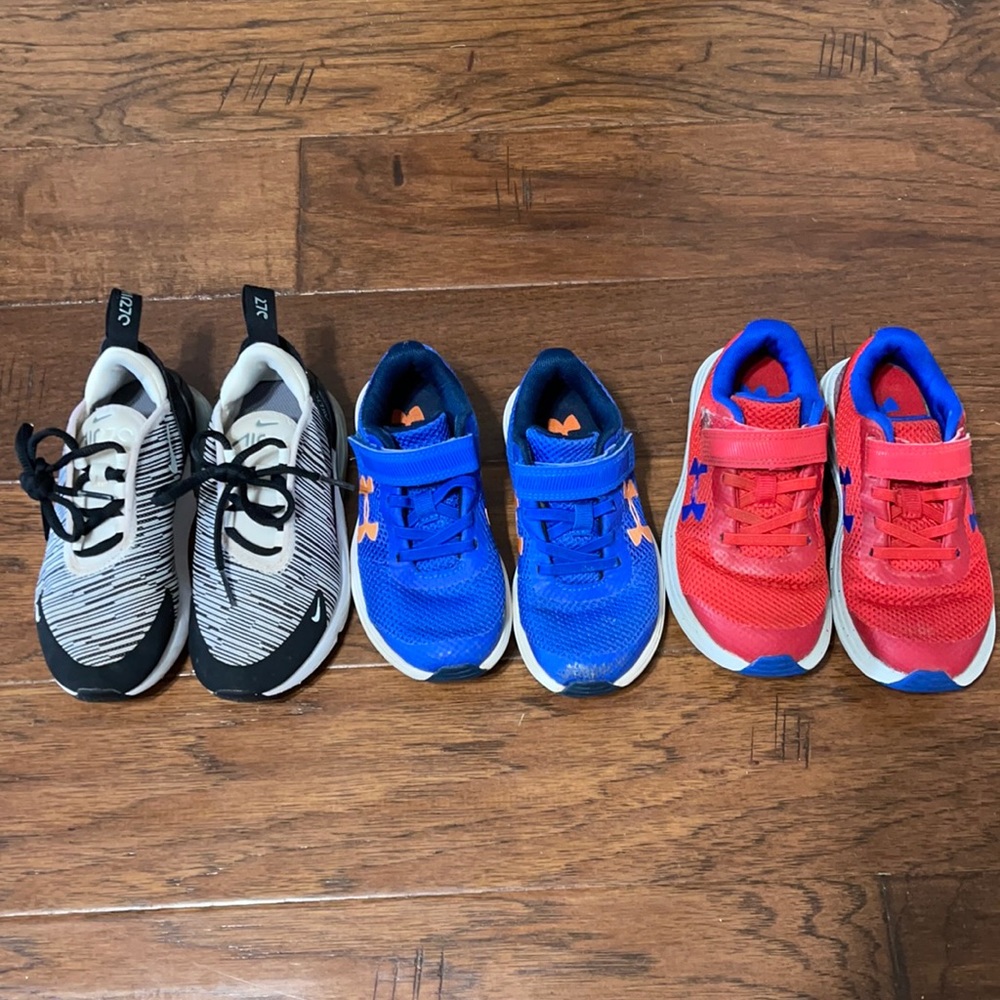 3 pair of boy’s shoes size 11 and 12 UA and Nike